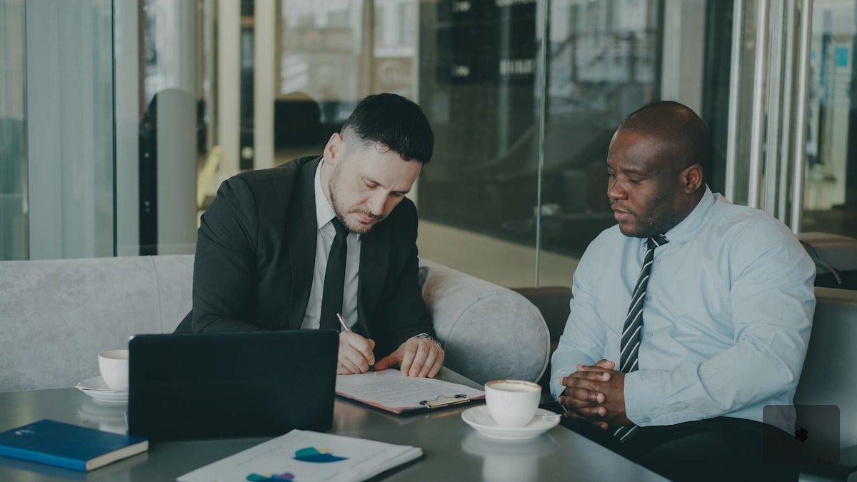 Wealth advisor meeting with client discussing portfolio insights
